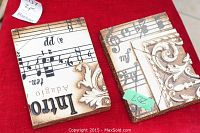 Overhead shot of two rectangular Memory Block tiles side by side on red cloth showing front designs