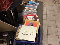Plastic crate filled with vinyl LPs showing Chicago album cover on top