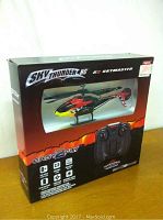 Box packaging of the Sky Thunder RC S2 Skymaster helicopter showing the helicopter and remote controller through a window.