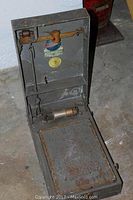 Open metal case showing balance arm, weighing platform, and interior labels from Chicago Scale Co. and City of Allentown.