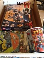 Lego Star Wars Droid Escape kit, Lego game CD, and Lego Movie cup in box