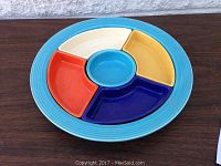 Assembled segmented platter with five removable containers in place