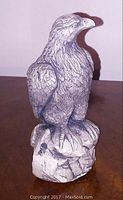 Front view of the handcrafted Mt. St. Helen volcanic ash eagle statue showing detailed feathers and perched stance.