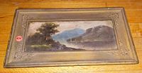 Front view of the rectangular framed watercolor lake scene painting, showing overall condition of artwork and frame.