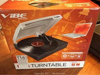 Photo of the Vibe Sound USB turntable box showing product image and branding