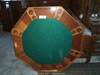 Octagonal card table games topper showing full tabletop with green felt center and wooden frame with multiple cup holders around edges.