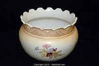 Full view of the Victorian ceramic jardiniere, displaying the floral painted design and scalloped rim with gold trim.