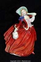 Front view of Royal Doulton Autumn Breezes HN1934 figurine in red dress holding basket