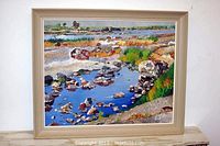 Frontal view of painting in wood frame