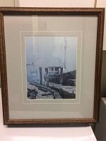 Full view of framed print depicting a fishing boat dock scene with seagulls in the background.