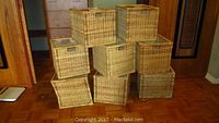 Eight wicker crates stacked in two columns, showing overall size and condition.