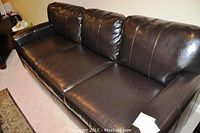 Front angled view showing three seat and three back cushions