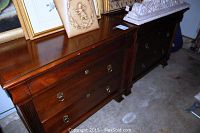 Front view of both nightstands side by side with decorative items on top