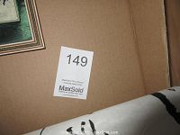 Close-up of framed Asian art pieces and scroll showing condition and size relative to box.