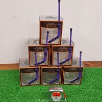 Six limited edition Crown Royal glasses in original packaging each containing a hockey stick themed stir stick.