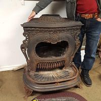 Front view of entire stove with person for scale