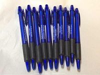 Ten blue retractable ballpoint pens with black grips arranged lying flat, showing the full set of pens.