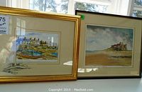 Both framed prints side by side on a surface