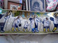 Front view of wool hooked wall hanging depicting procession of figures in white, blue, yellow, green