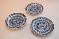 Three side plates arranged on white background showcasing pattern