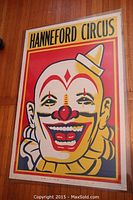 Full view of the lithographed circus clown poster with bold text "HANNEFORD CIRCUS" and a smiling clown face in red, yellow, and black.