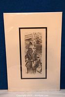 Full view of matted etching showing the entire artwork with white and black mat borders, protected in plastic sleeve, against a blue background.