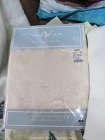 Villager brand beige pattern table cover in packaging