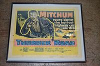 Framed movie lobby card for Thunder Road laid flat on a surface, showing full front view