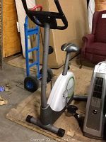 Weslo Pursuit 350 exercise bike, showing the entire bike including the seat, pedals, and handlebar with control console.