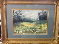 Front view of framed watercolour landscape painting signed J MacLachlan, showing the ornate gold frame and matting.