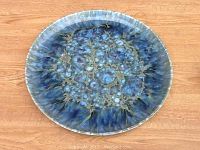 Top view showing the blue-green crystalline glaze with bursts and patterns.