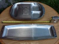 Photo of divided roast carving tray and rectangular fish serving tray with measuring tape showing size