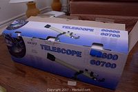 Original telescopes retail box of Swift 860R model telescope showing branding and model number 60600, 60700, 860R.