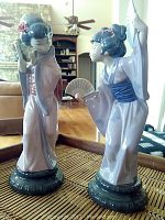 Front view of both figurines side by side on tray