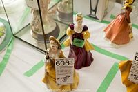 Photo showing both Sandra HN2275 and Loretta HN2337 Royal Doulton figurines displayed together.