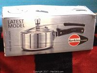 Front of the box showing the Hawkins Classic pressure cooker image and text 'Latest Model'.