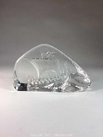 Front view of lead crystal paperweight showing Viking ship inside