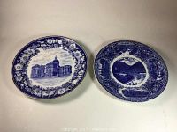 Two blue and white transfer decorated plates shown side by side on a white surface, one with Indianapolis State House and the other with Delaware Water Gap scene, highlighting overall condition and decoration