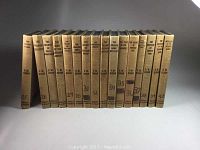 Full set of brown covered Hardy Boy juvenile hardcover books showing spines with volume numbers 25 to 40