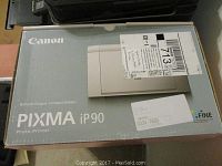 Canon Pixma iP90 photo printer box, showing model and branding.