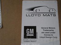 Label showing Lloyd Mats branding and GM official licensed product for Cadillac floor mats.