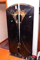 Two two-panel folding screens side by side