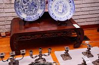 Front view showing carved floral and grapevine apron and scrolling legs