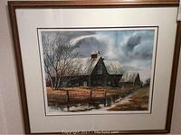 Front view of framed watercolor painting showing barn and trees