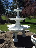 Front view of full three-tier fountain in yard
