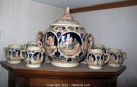 Full view of Gerz covered soup tureen with matching mugs arranged around it