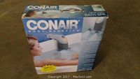 Boxed Conair Bath Spa device showing product image and branding