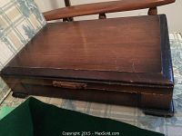 Closed wooden box containing Community silverplate cutlery set.