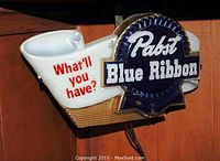 Front view of plastic Pabst Blue Ribbon electric bar light showing logo and slogan.