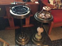 Two floor stand ashtrays side by side, showing overall look and material contrast.